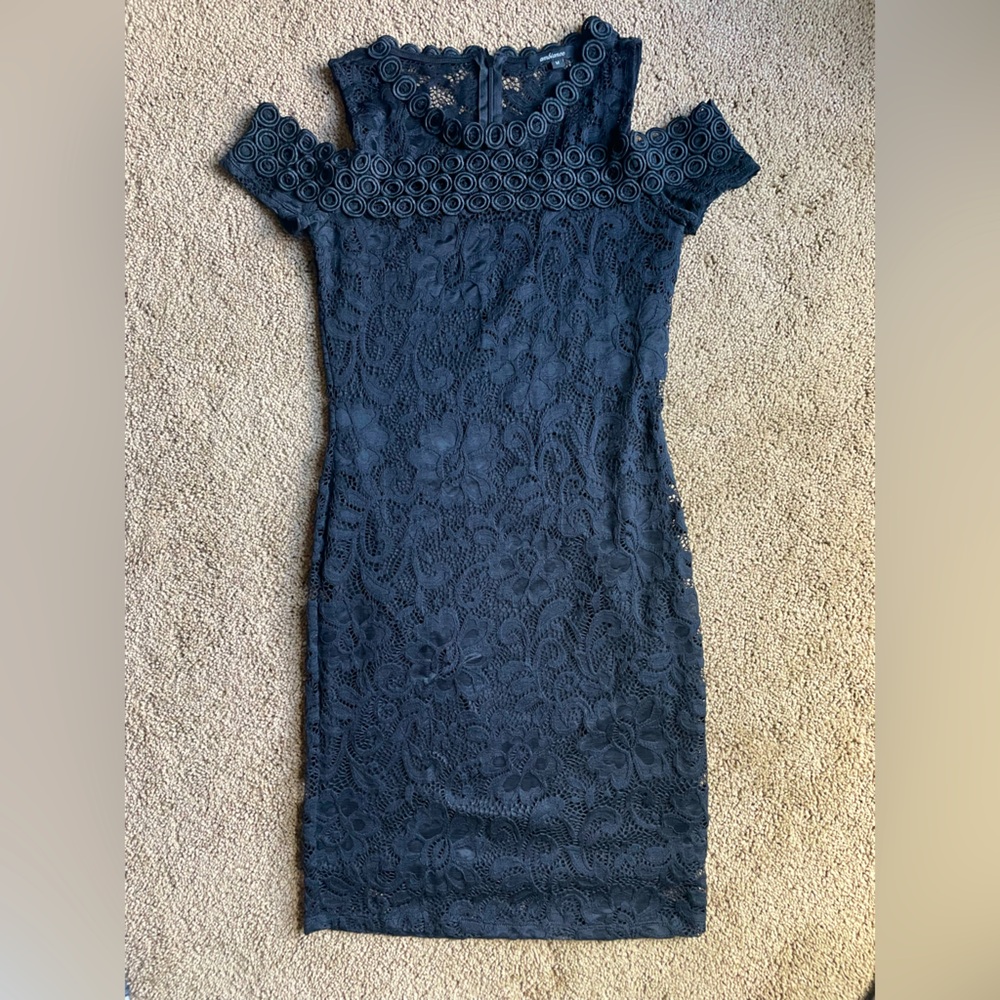 Black fitted dress with black lace. Open shoulder